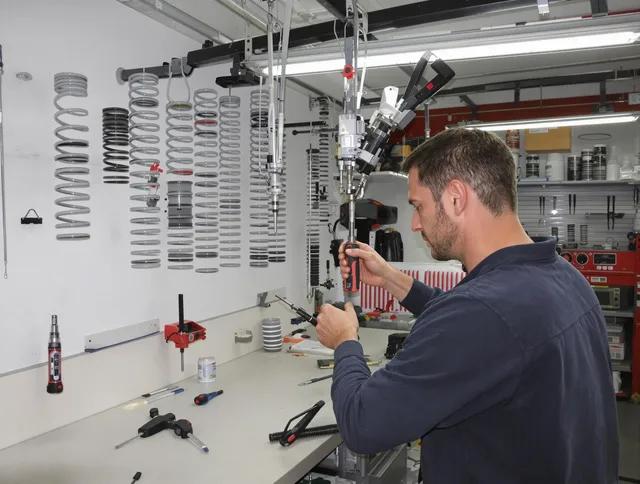 Southington Garage Door Repair safety certified technician performing precision spring replacement in Southington