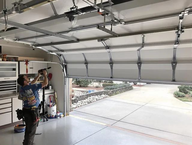 Garage door track repair service by Southington Garage Door Repair in Southington